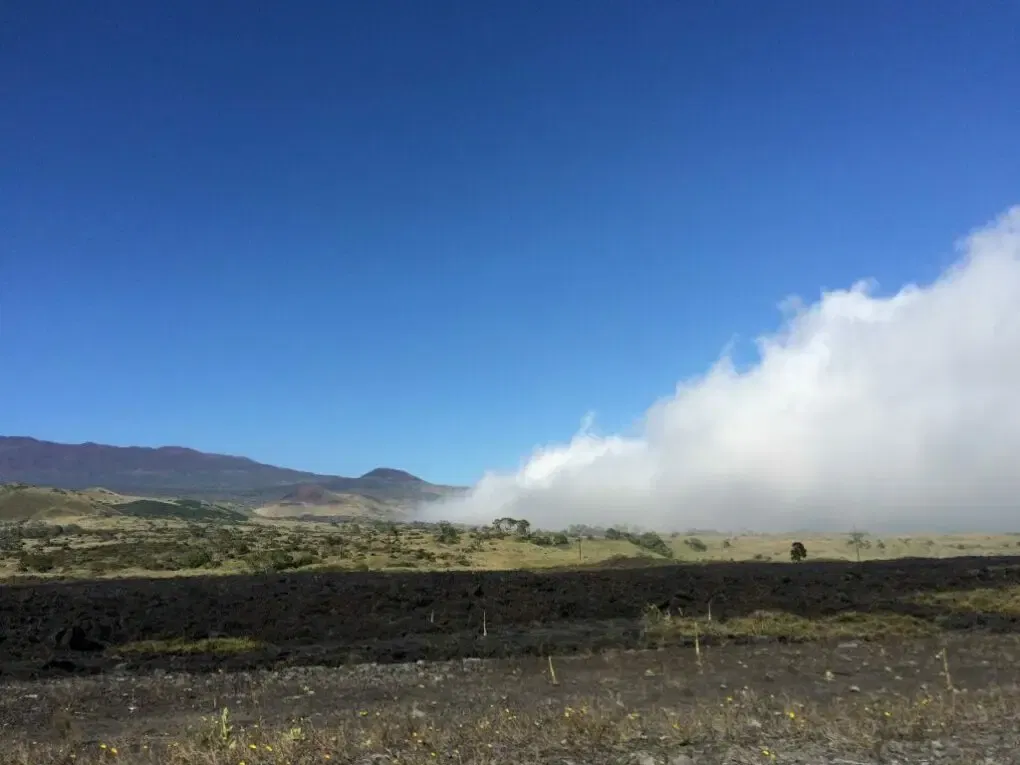 Wolken vorm Mauna Kea